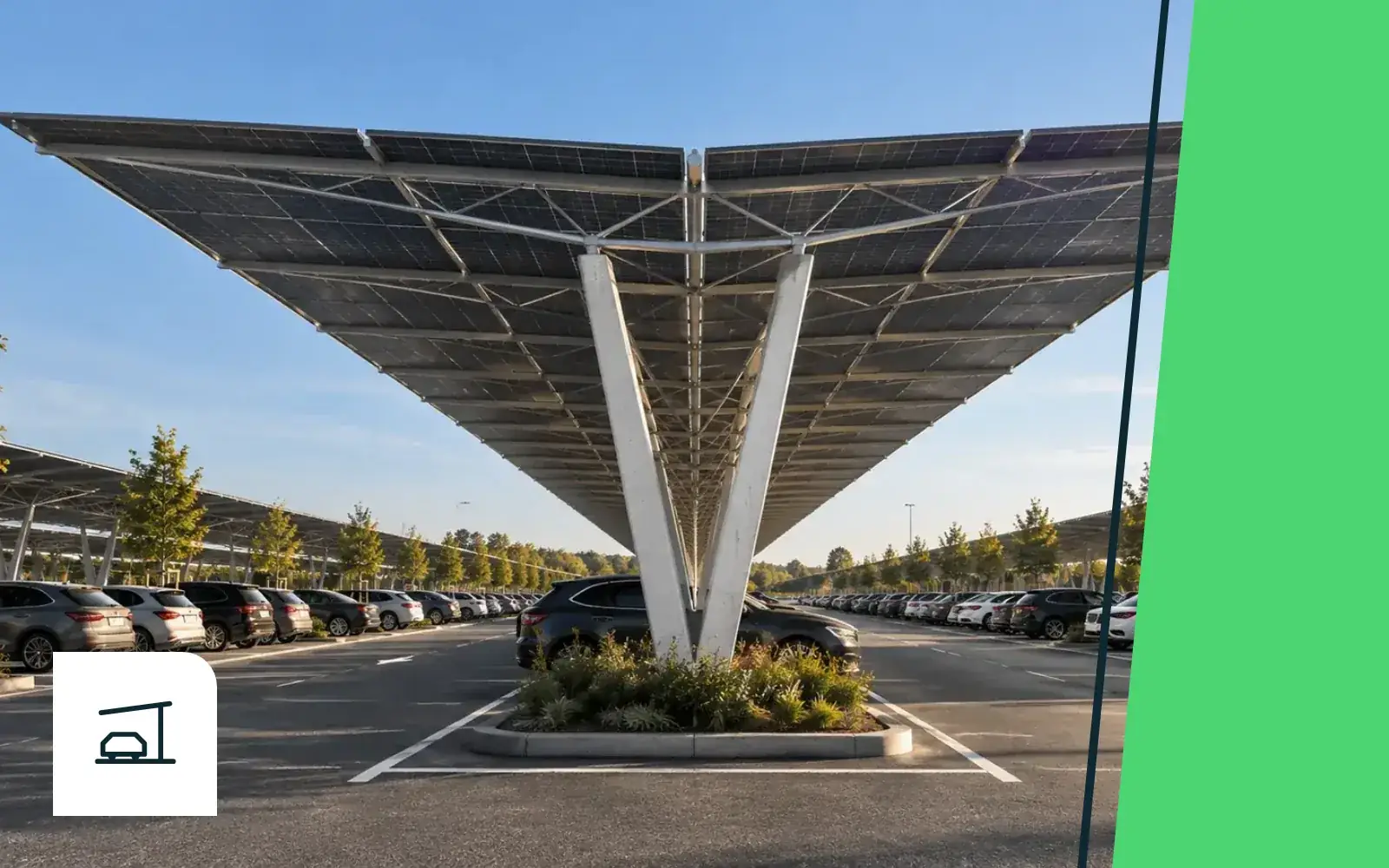 Carport solaire SUUN grande portée sur un parking, appui en V dans un îlot planté, vision SUUN