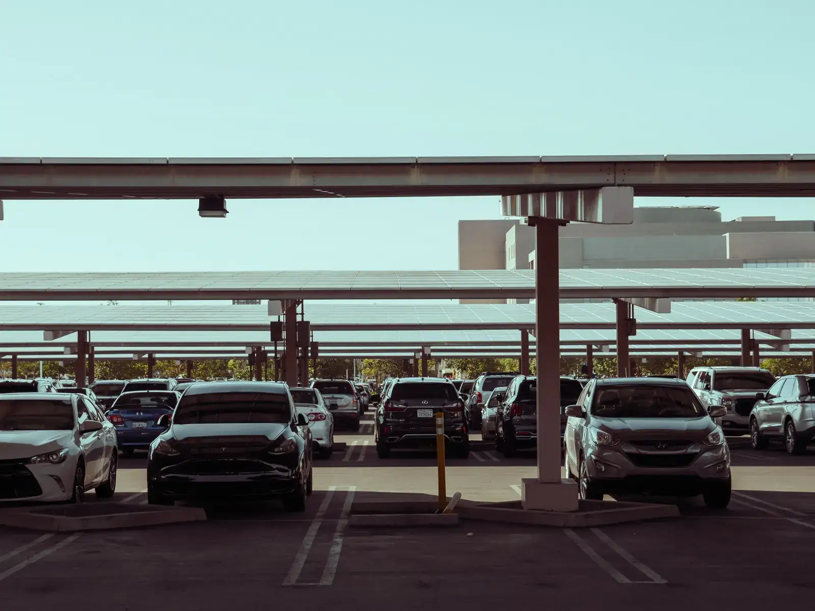 Conventional carport: a row of columns every few spaces.